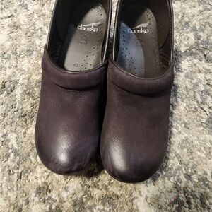 Dansko Black Mules and Clogs with Leather Material and Slip-On Design